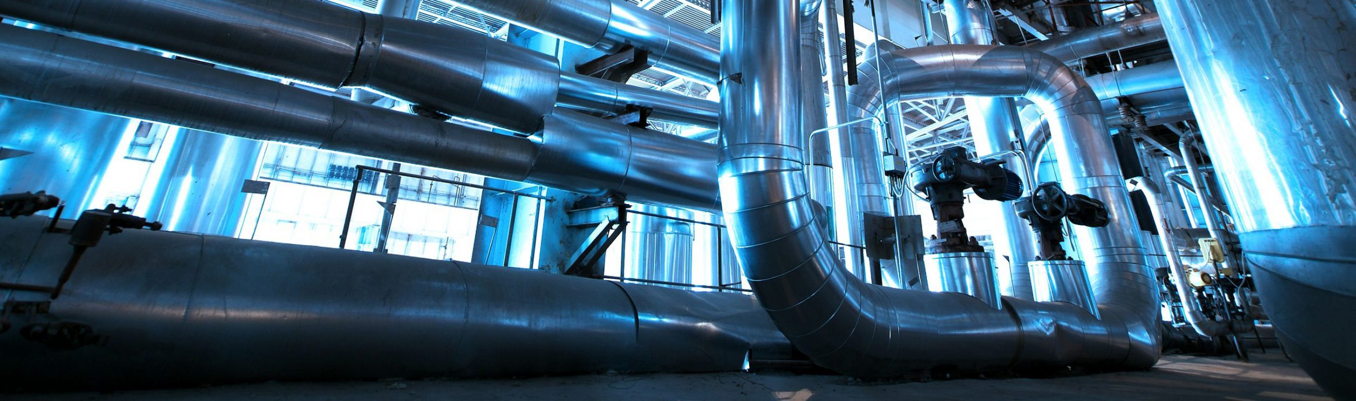 21935026 - equipment, cables and piping as found inside of  industrial power plant